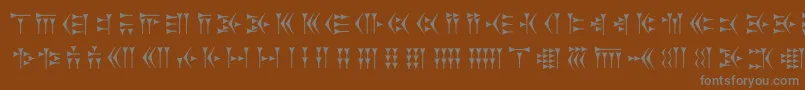 Zarathustra Font – Gray Fonts on Brown Background