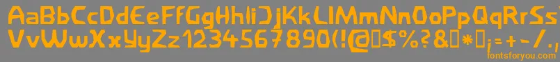 フォントFilirat1 – オレンジの文字は灰色の背景にあります。