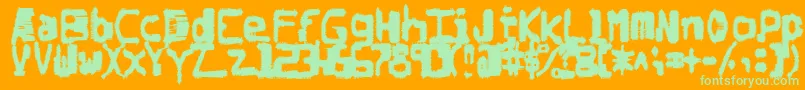フォントDegradedchipcreep – オレンジの背景に緑のフォント