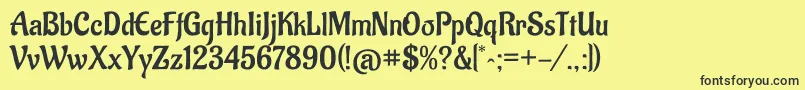 AladinRegular Font – Black Fonts on Yellow Background