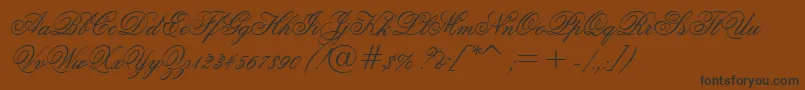GrandPrixEs Font – Black Fonts on Brown Background