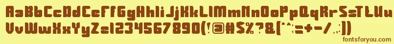 Guardian Font – Brown Fonts on Yellow Background