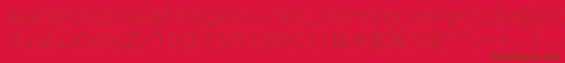 Police 99%OrnamentReg – polices brunes sur fond rouge