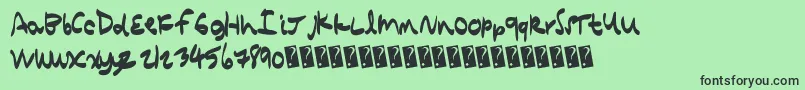Quickcomic-Schriftart – Schwarze Schriften auf grünem Hintergrund