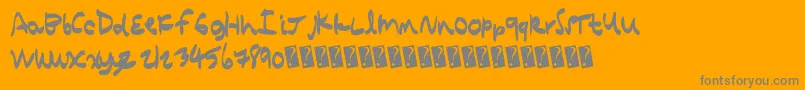 Quickcomic-Schriftart – Graue Schriften auf orangefarbenem Hintergrund