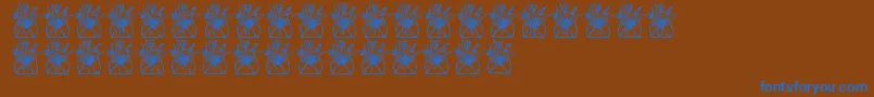 LmsLetterToMomPart1 Font – Blue Fonts on Brown Background