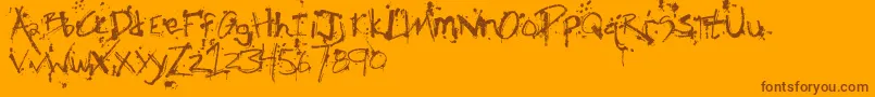 Fonte FhObscene – fontes marrons em um fundo laranja