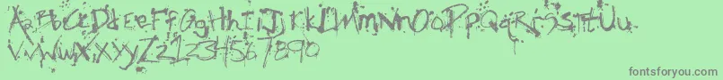 FhObscene-Schriftart – Graue Schriften auf grünem Hintergrund