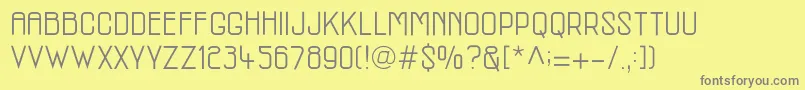 McmRegular Font – Gray Fonts on Yellow Background