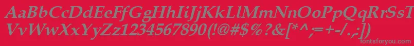 Queensbi-fontti – harmaat kirjasimet punaisella taustalla