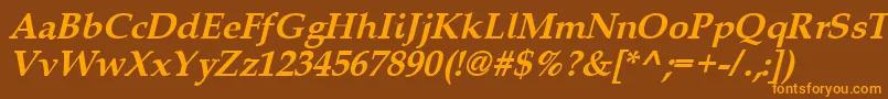 Queensbi-Schriftart – Orangefarbene Schriften auf braunem Hintergrund