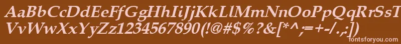 Queensbi-fontti – vaaleanpunaiset fontit ruskealla taustalla