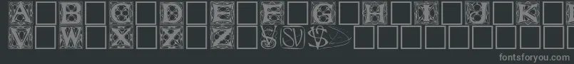 Innisfere-fontti – harmaat kirjasimet mustalla taustalla