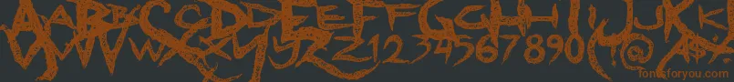 フォントDreadlockfont – 黒い背景に茶色のフォント