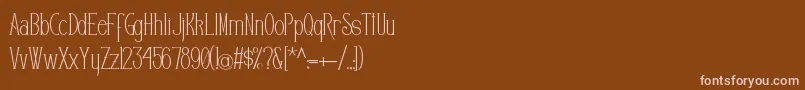 Editors-fontti – vaaleanpunaiset fontit ruskealla taustalla
