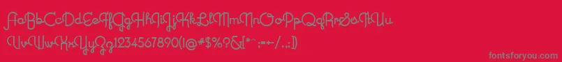 NewRecord-fontti – harmaat kirjasimet punaisella taustalla