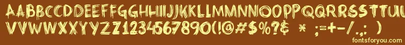 DkCrissCross Font – Yellow Fonts on Brown Background