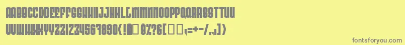 フォントRadovhn – 黄色の背景に灰色の文字