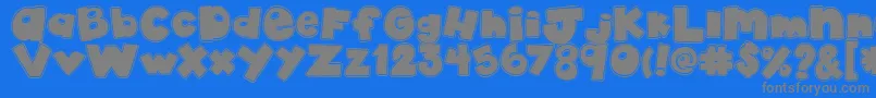 AkadylanCollage Font – Gray Fonts on Blue Background