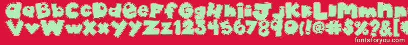 AkadylanCollage Font – Green Fonts on Red Background