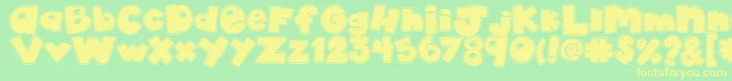 AkadylanCollage Font – Yellow Fonts on Green Background