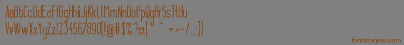 フォントYgraineSkeleton – 茶色の文字が灰色の背景にあります。