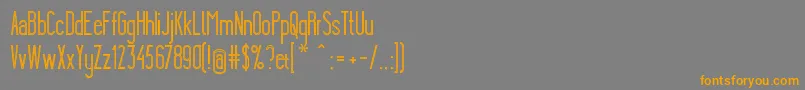YgraineSkeleton-Schriftart – Orangefarbene Schriften auf grauem Hintergrund
