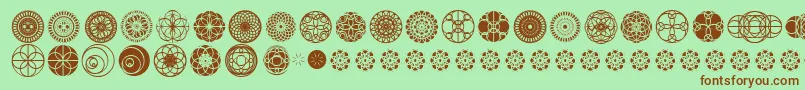 KaleidoscopicVision Font – Brown Fonts on Green Background