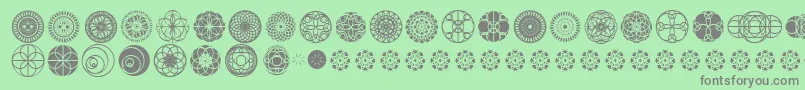 フォントKaleidoscopicVision – 緑の背景に灰色の文字