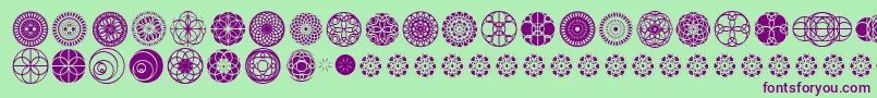 フォントKaleidoscopicVision – 緑の背景に紫のフォント