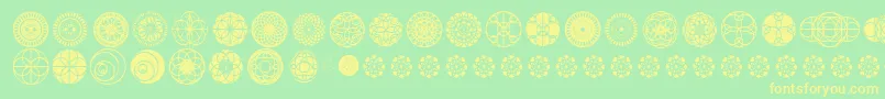 KaleidoscopicVision Font – Yellow Fonts on Green Background