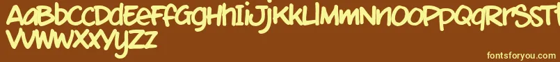 MixtmkT Font – Yellow Fonts on Brown Background