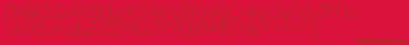 SilverBellybuttonRingReg2-Schriftart – Braune Schriften auf rotem Hintergrund