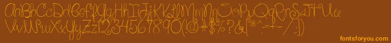 SilverBellybuttonRingReg2-Schriftart – Orangefarbene Schriften auf braunem Hintergrund