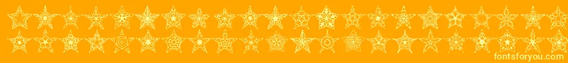フォント90StarsBrk – オレンジの背景に黄色の文字
