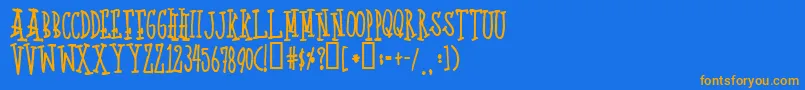 フォントQuotp – オレンジ色の文字が青い背景にあります。