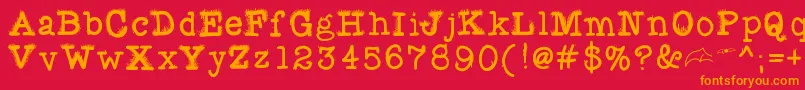 フォントFuzzybat – 赤い背景にオレンジの文字