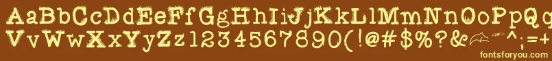 Fuzzybat-fontti – keltaiset fontit ruskealla taustalla