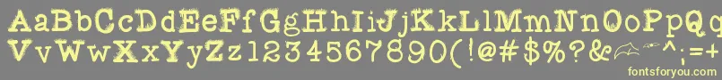 Fuzzybat Font – Yellow Fonts on Gray Background