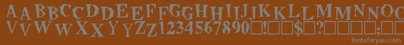 BeatnikPlain-fontti – harmaat kirjasimet ruskealla taustalla