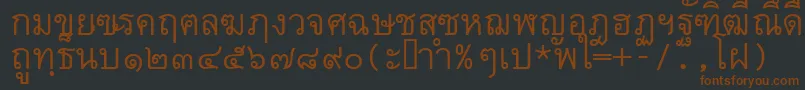 Fonte Thai7bangkokssk – fontes marrons em um fundo preto