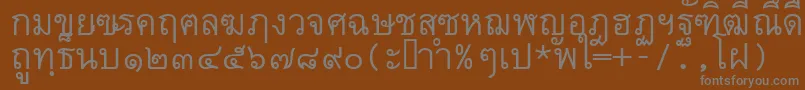 Czcionka Thai7bangkokssk – szare czcionki na brązowym tle