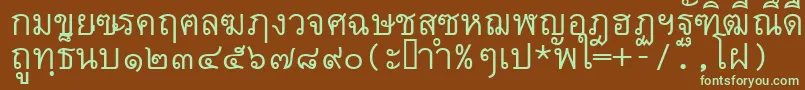 フォントThai7bangkokssk – 緑色の文字が茶色の背景にあります。