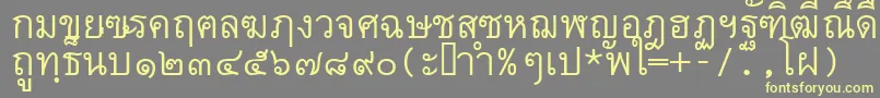 Czcionka Thai7bangkokssk – żółte czcionki na szarym tle