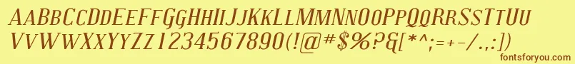 フォントCovingtonScExpItalic – 茶色の文字が黄色の背景にあります。