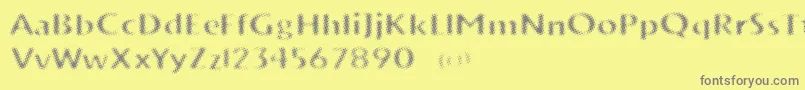 フォントVtksTrunkset – 黄色の背景に灰色の文字