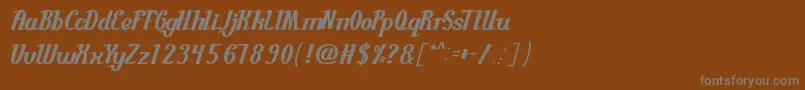 GuitarRumble-Schriftart – Graue Schriften auf braunem Hintergrund