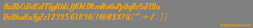 フォントGuitarRumble – オレンジの文字は灰色の背景にあります。