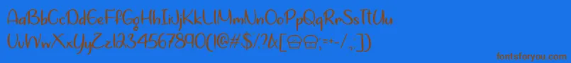 LetsBakeMuffinsOtf Font – Brown Fonts on Blue Background