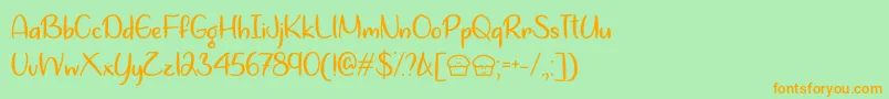 Шрифт LetsBakeMuffinsOtf – оранжевые шрифты на зелёном фоне